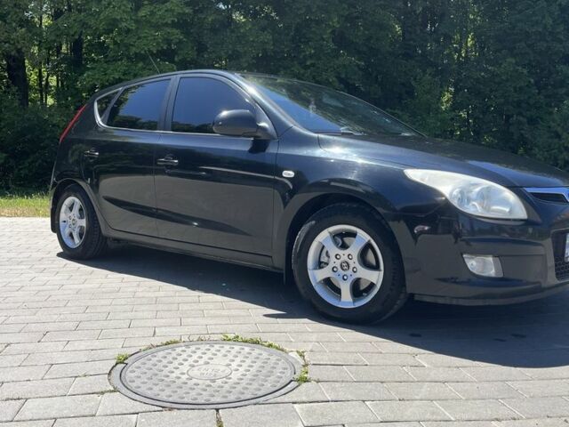 Чорний Хендай i30, об'ємом двигуна 1.6 л та пробігом 303 тис. км за 4700 $, фото 1 на Automoto.ua