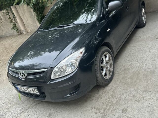 Чорний Хендай i30, об'ємом двигуна 1.4 л та пробігом 178 тис. км за 5709 $, фото 1 на Automoto.ua