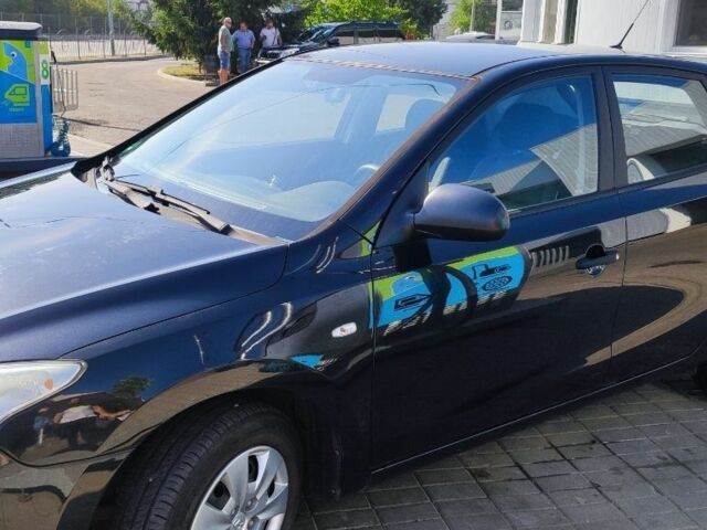 Чорний Хендай i30, об'ємом двигуна 1.4 л та пробігом 165 тис. км за 5496 $, фото 1 на Automoto.ua