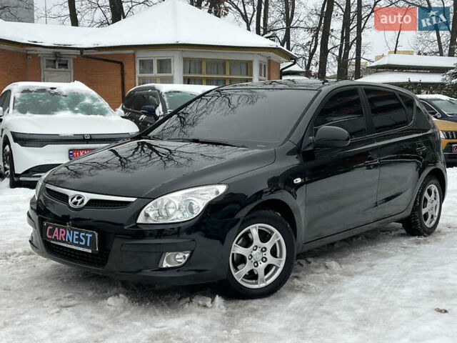 Черный Хендай i30, объемом двигателя 1.6 л и пробегом 223 тыс. км за 6000 $, фото 1 на Automoto.ua