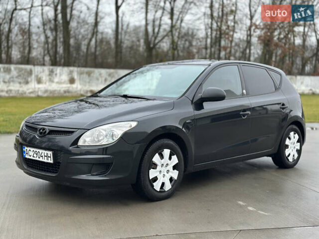 Чорний Хендай i30, об'ємом двигуна 1.4 л та пробігом 204 тис. км за 5950 $, фото 1 на Automoto.ua
