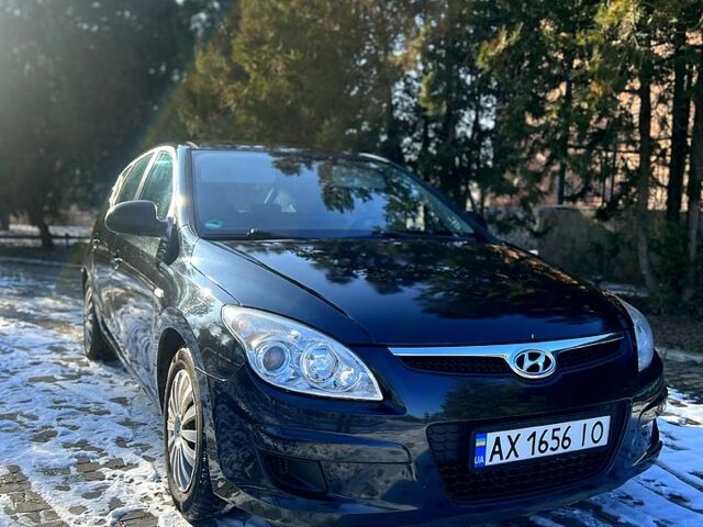 Чорний Хендай i30, об'ємом двигуна 1.4 л та пробігом 195 тис. км за 5650 $, фото 1 на Automoto.ua