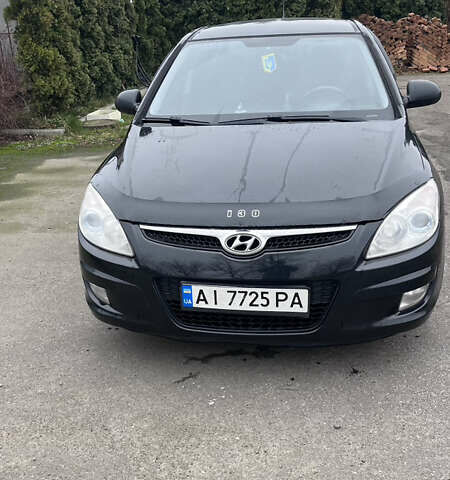 Черный Хендай i30, объемом двигателя 1.6 л и пробегом 255 тыс. км за 6800 $, фото 1 на Automoto.ua