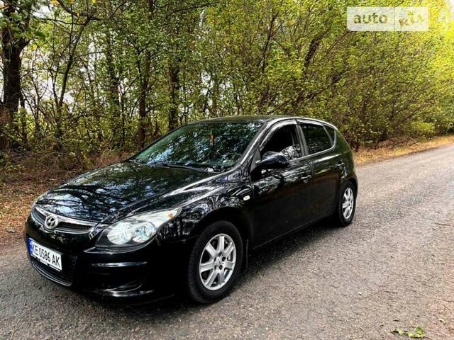 Черный Хендай i30, объемом двигателя 1.4 л и пробегом 150 тыс. км за 5400 $, фото 1 на Automoto.ua