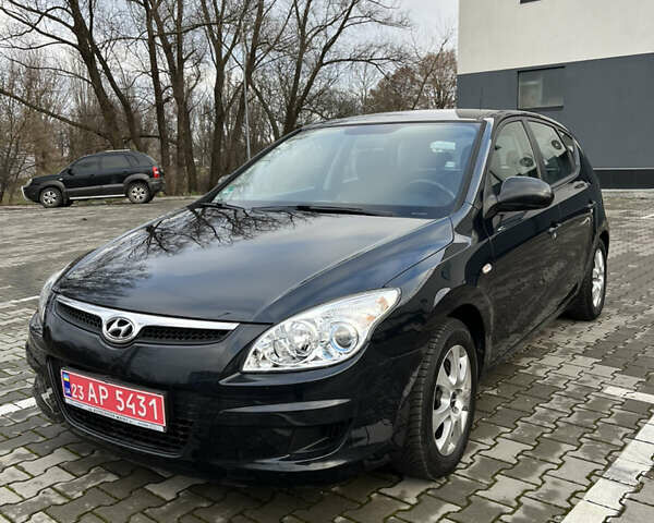 Черный Хендай i30, объемом двигателя 1.4 л и пробегом 140 тыс. км за 6300 $, фото 1 на Automoto.ua