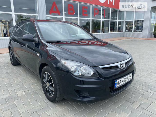 Чорний Хендай i30, об'ємом двигуна 1.4 л та пробігом 261 тис. км за 5800 $, фото 1 на Automoto.ua