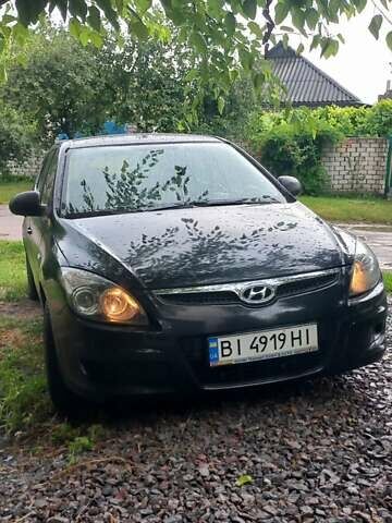 Черный Хендай i30, объемом двигателя 1.4 л и пробегом 275 тыс. км за 4700 $, фото 1 на Automoto.ua