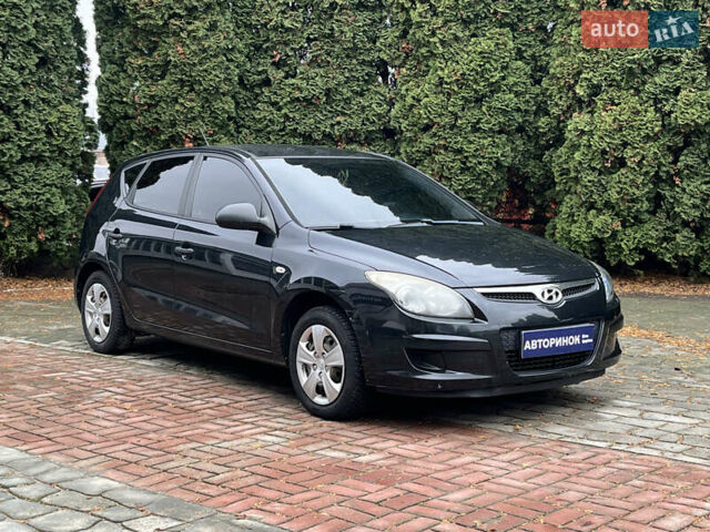 Черный Хендай i30, объемом двигателя 1.4 л и пробегом 240 тыс. км за 6000 $, фото 1 на Automoto.ua