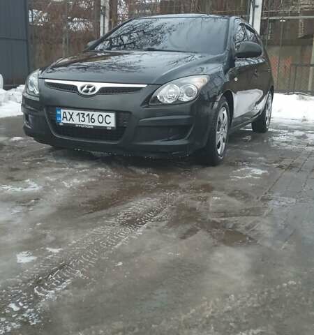 Черный Хендай i30, объемом двигателя 1.4 л и пробегом 144 тыс. км за 6300 $, фото 1 на Automoto.ua