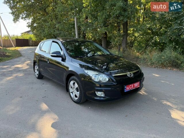 Черный Хендай i30, объемом двигателя 1.4 л и пробегом 193 тыс. км за 6600 $, фото 1 на Automoto.ua