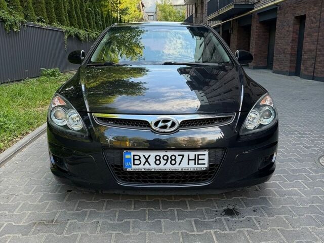 Черный Хендай i30, объемом двигателя 1.4 л и пробегом 229 тыс. км за 5499 $, фото 1 на Automoto.ua