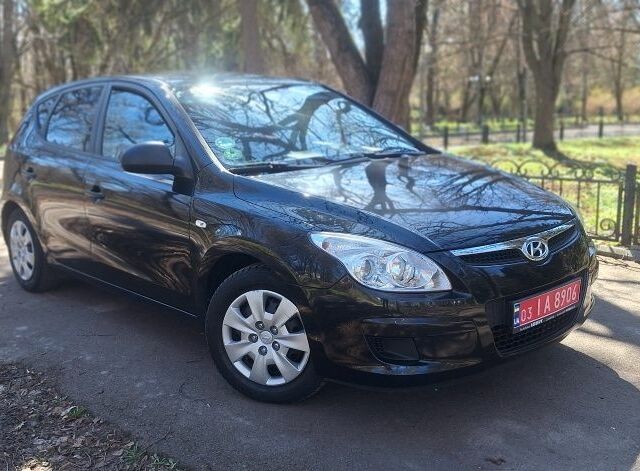Черный Хендай i30, объемом двигателя 1.4 л и пробегом 163 тыс. км за 6300 $, фото 1 на Automoto.ua