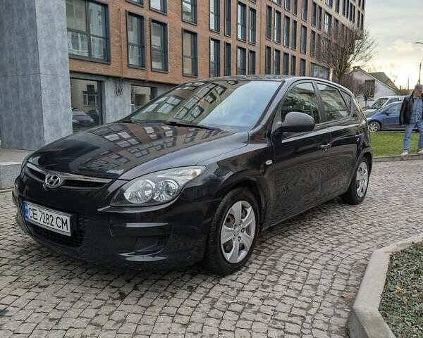 Черный Хендай i30, объемом двигателя 1.4 л и пробегом 174 тыс. км за 4800 $, фото 1 на Automoto.ua