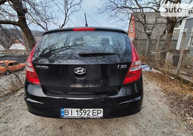 Чорний Хендай i30, об'ємом двигуна 1.4 л та пробігом 272 тис. км за 5300 $, фото 1 на Automoto.ua