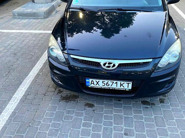 Чорний Хендай i30, об'ємом двигуна 1.4 л та пробігом 194 тис. км за 6000 $, фото 1 на Automoto.ua