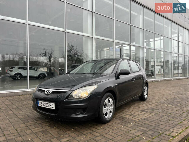 Чорний Хендай i30, об'ємом двигуна 1.4 л та пробігом 247 тис. км за 5800 $, фото 1 на Automoto.ua
