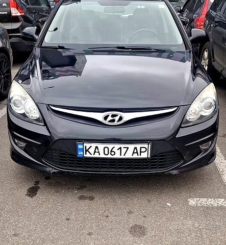Черный Хендай i30, объемом двигателя 1.6 л и пробегом 241 тыс. км за 4900 $, фото 1 на Automoto.ua