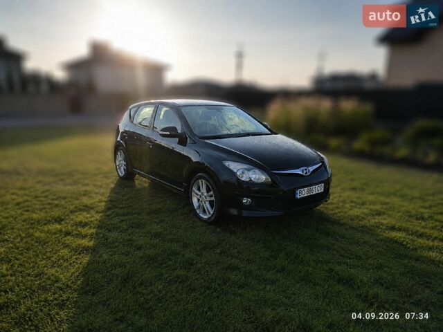 Черный Хендай i30, объемом двигателя 1.6 л и пробегом 231 тыс. км за 7400 $, фото 1 на Automoto.ua