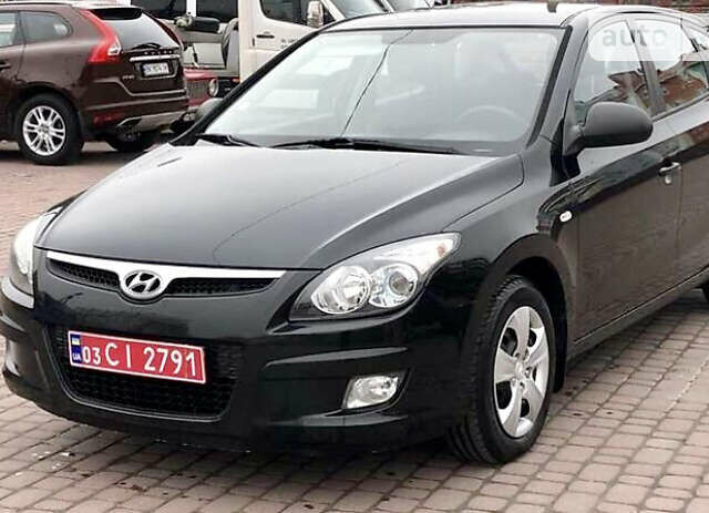 Черный Хендай i30, объемом двигателя 1.6 л и пробегом 256 тыс. км за 6099 $, фото 1 на Automoto.ua