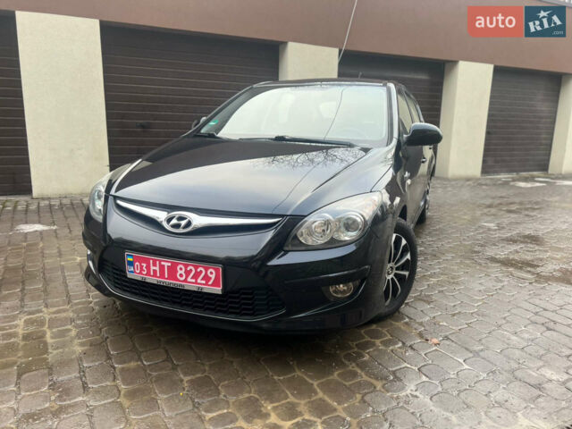 Черный Хендай i30, объемом двигателя 1.4 л и пробегом 176 тыс. км за 5699 $, фото 1 на Automoto.ua