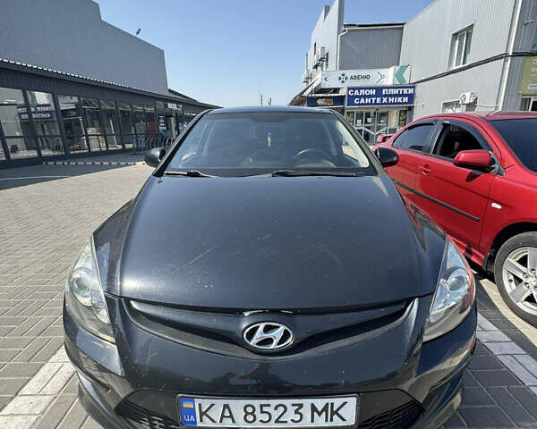 Черный Хендай i30, объемом двигателя 1.4 л и пробегом 215 тыс. км за 6000 $, фото 1 на Automoto.ua