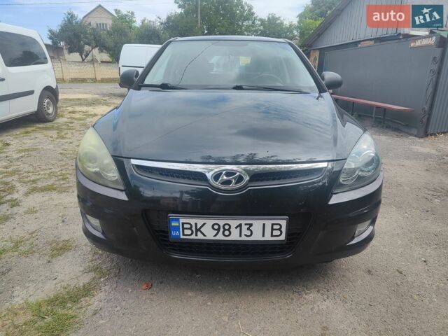 Чорний Хендай i30, об'ємом двигуна 1.58 л та пробігом 321 тис. км за 5500 $, фото 1 на Automoto.ua
