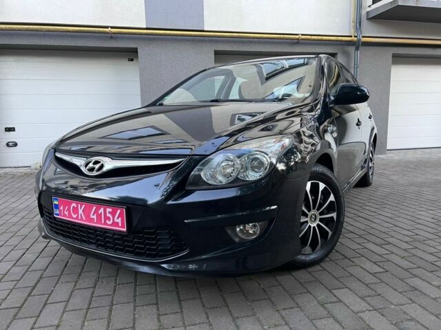 Чорний Хендай i30, об'ємом двигуна 1.4 л та пробігом 176 тис. км за 6024 $, фото 1 на Automoto.ua