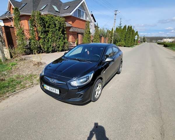 Черный Хендай i30, объемом двигателя 1.4 л и пробегом 119 тыс. км за 7600 $, фото 1 на Automoto.ua