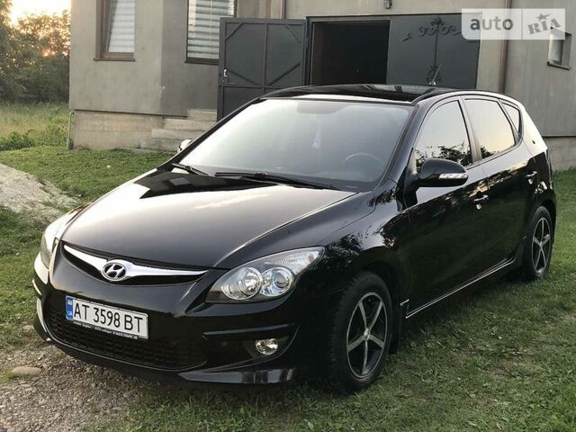 Чорний Хендай i30, об'ємом двигуна 1.6 л та пробігом 164 тис. км за 6999 $, фото 1 на Automoto.ua