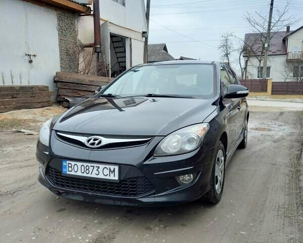 Черный Хендай i30, объемом двигателя 1.6 л и пробегом 354 тыс. км за 6100 $, фото 1 на Automoto.ua
