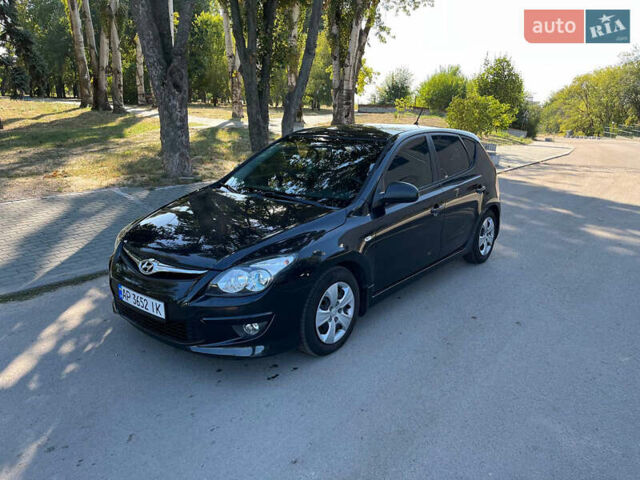 Черный Хендай i30, объемом двигателя 1.4 л и пробегом 230 тыс. км за 6200 $, фото 1 на Automoto.ua