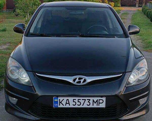 Черный Хендай i30, объемом двигателя 1.59 л и пробегом 180 тыс. км за 7000 $, фото 1 на Automoto.ua