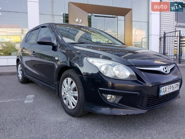 Черный Хендай i30, объемом двигателя 1.58 л и пробегом 226 тыс. км за 5100 $, фото 1 на Automoto.ua