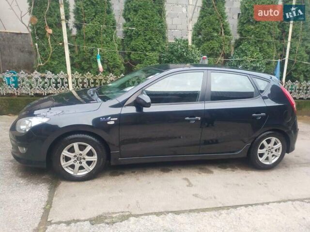 Чорний Хендай i30, об'ємом двигуна 1.58 л та пробігом 215 тис. км за 6900 $, фото 1 на Automoto.ua