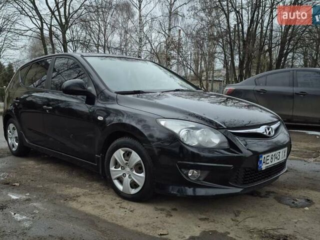 Черный Хендай i30, объемом двигателя 1.58 л и пробегом 125 тыс. км за 7200 $, фото 1 на Automoto.ua
