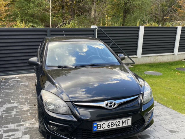 Черный Хендай i30, объемом двигателя 1.4 л и пробегом 186 тыс. км за 5700 $, фото 1 на Automoto.ua