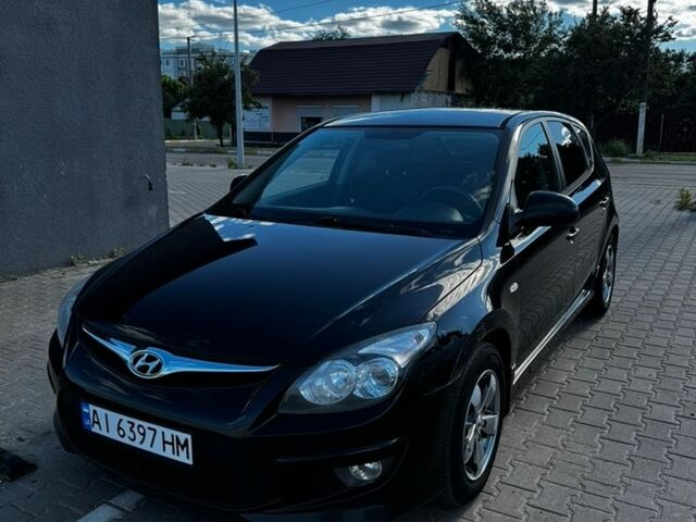 Чорний Хендай i30, об'ємом двигуна 1.58 л та пробігом 172 тис. км за 6900 $, фото 1 на Automoto.ua