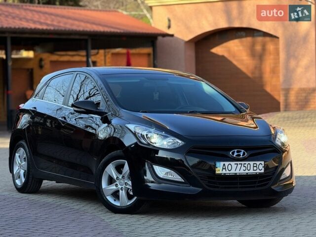 Чорний Хендай i30, об'ємом двигуна 1.59 л та пробігом 209 тис. км за 10900 $, фото 1 на Automoto.ua