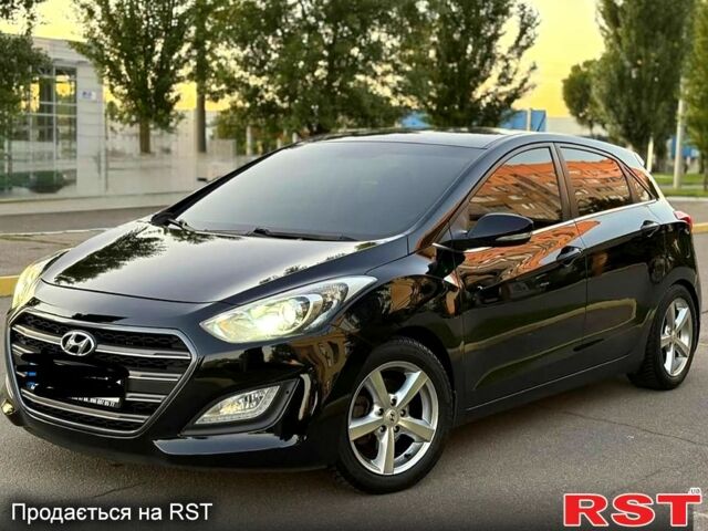 Чорний Хендай i30, об'ємом двигуна 1.6 л та пробігом 160 тис. км за 8350 $, фото 1 на Automoto.ua