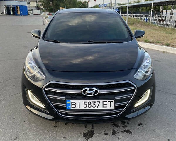 Черный Хендай i30, объемом двигателя 1.6 л и пробегом 245 тыс. км за 9999 $, фото 1 на Automoto.ua