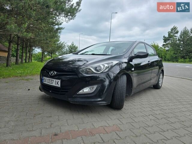 Черный Хендай i30, объемом двигателя 1.4 л и пробегом 305 тыс. км за 7350 $, фото 1 на Automoto.ua