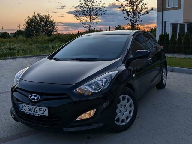 Черный Хендай i30, объемом двигателя 1.4 л и пробегом 138 тыс. км за 8700 $, фото 1 на Automoto.ua
