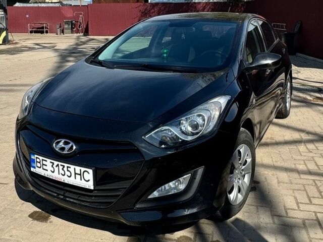 Чорний Хендай i30, об'ємом двигуна 1.4 л та пробігом 220 тис. км за 7300 $, фото 1 на Automoto.ua