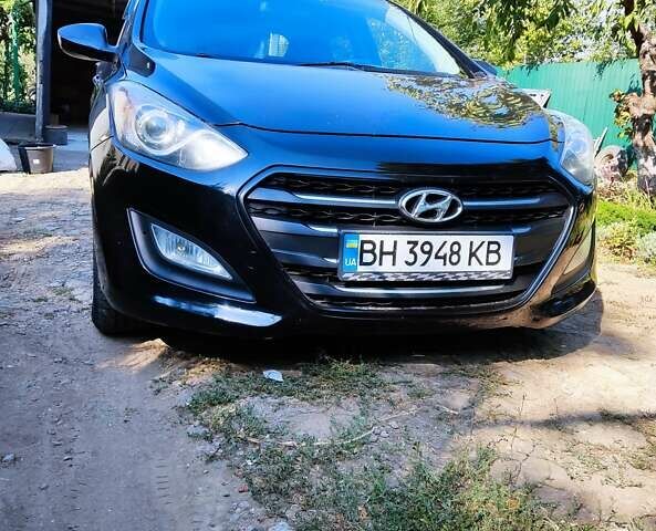 Черный Хендай i30, объемом двигателя 1.59 л и пробегом 190 тыс. км за 7100 $, фото 1 на Automoto.ua