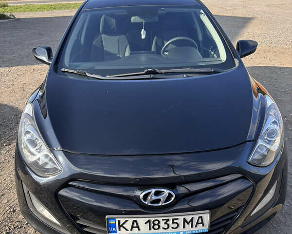 Черный Хендай i30, объемом двигателя 1.58 л и пробегом 160 тыс. км за 10900 $, фото 1 на Automoto.ua