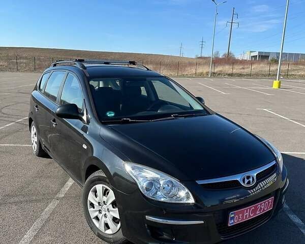 Черный Хендай i30, объемом двигателя 1.6 л и пробегом 194 тыс. км за 6750 $, фото 1 на Automoto.ua