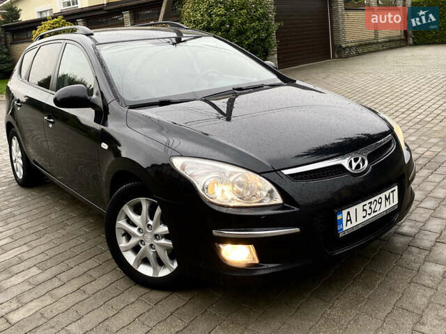 Черный Хендай i30, объемом двигателя 1.58 л и пробегом 341 тыс. км за 6200 $, фото 1 на Automoto.ua