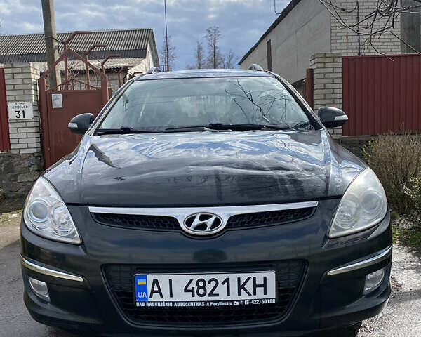 Черный Хендай i30, объемом двигателя 1.6 л и пробегом 324 тыс. км за 4900 $, фото 1 на Automoto.ua
