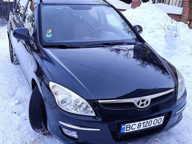 Черный Хендай i30, объемом двигателя 1.6 л и пробегом 34000 тыс. км за 5499 $, фото 1 на Automoto.ua