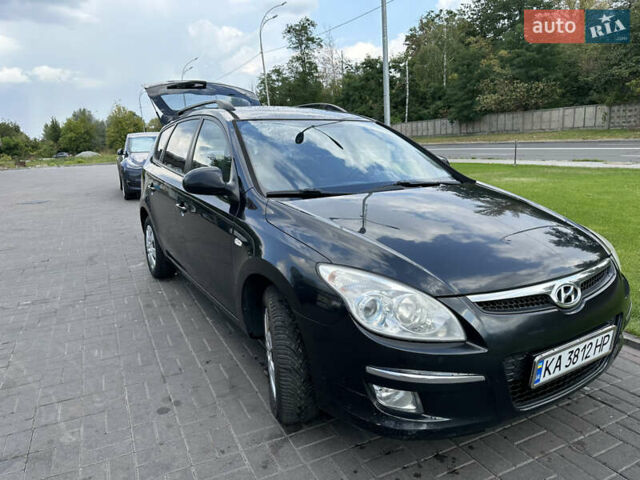 Чорний Хендай i30, об'ємом двигуна 1.58 л та пробігом 257 тис. км за 5650 $, фото 1 на Automoto.ua